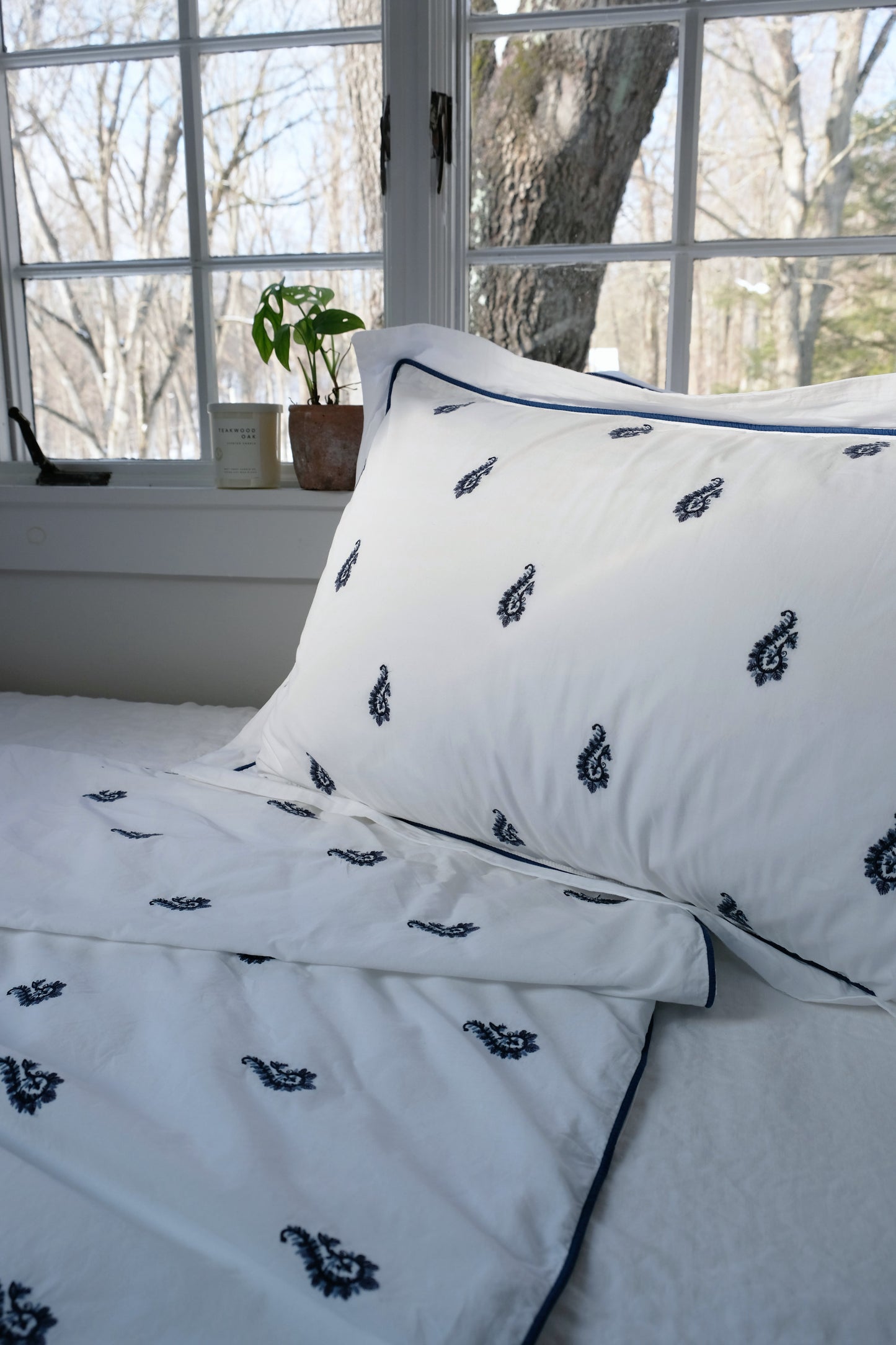 Blue Paisley embroidered duvet set full-bed view with matching shams
